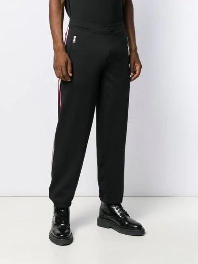 Shop Neil Barrett Stripe Detail Trousers In Black