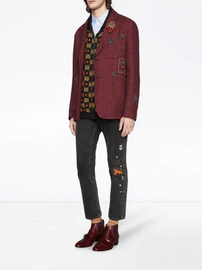 Shop Gucci Embroidered Motif Slim-fit Jeans In Black