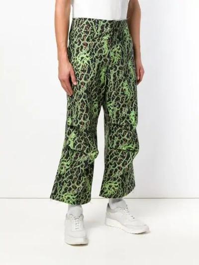 Shop Sankuanz Camouflage Print Wide Leg Trousers - Black
