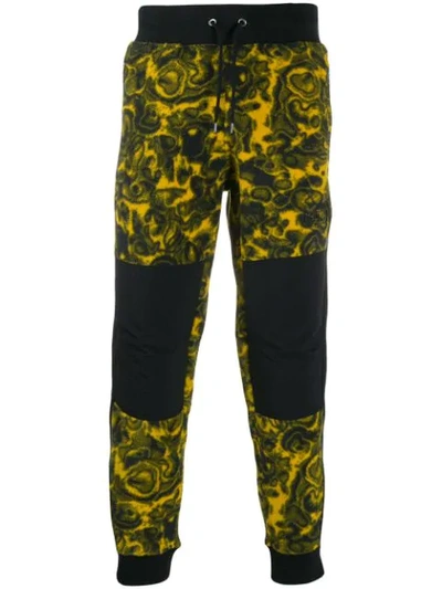 Shop The North Face Paint Swirl Fleece Pants In Yellow