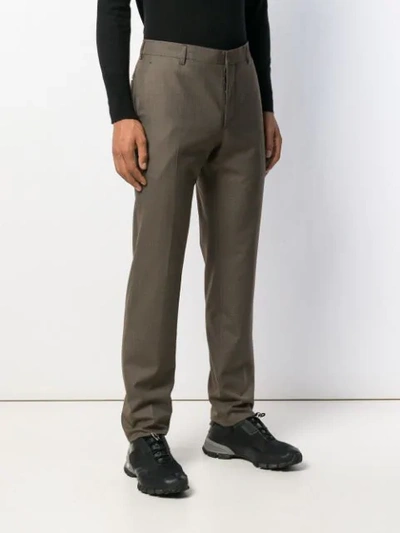 Shop Prada Checked Slim-fit Trousers In Green