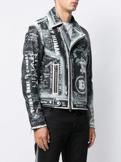 Shop Balmain Graffiti Print Leather Jacket In Black