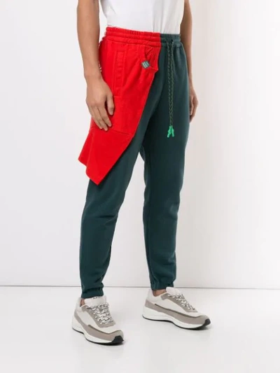 Shop Miharayasuhiro Asymmetric Style Track Pants In Red