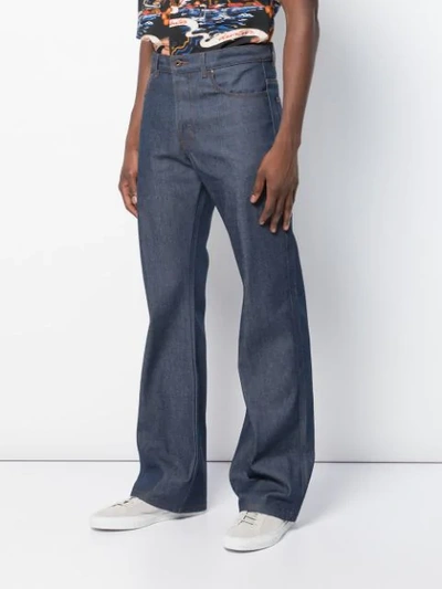 Shop Naked And Famous Groovy Guy Bootcut Jeans In Blue