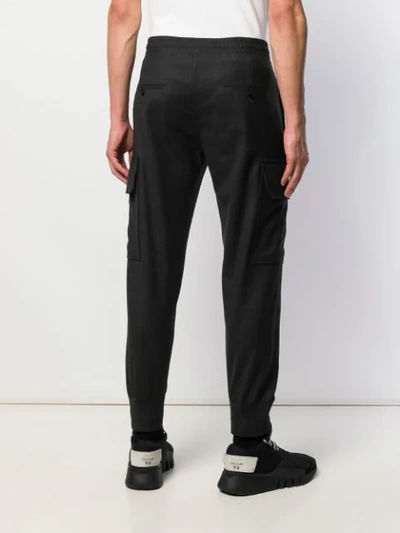 Shop Neil Barrett Elasticated Tapered Trousers In Grey