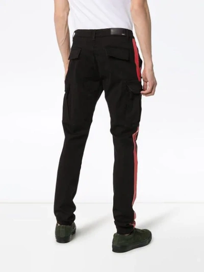 Shop Amiri Stripe Leg Utility Pocket Cargo Pants In Black