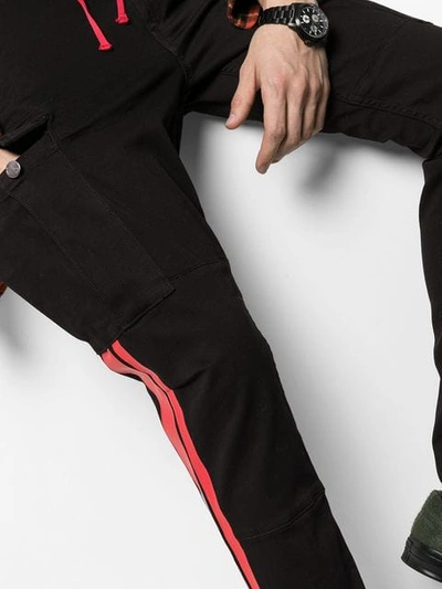 Shop Amiri Stripe Leg Utility Pocket Cargo Pants In Black