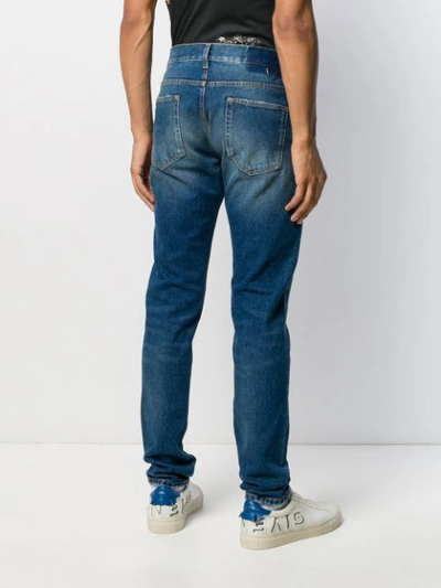 Shop Htc Los Angeles Skinny Jeans In Blue