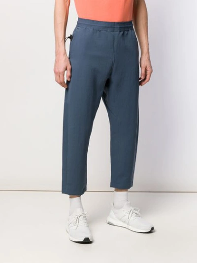 Shop Nike Cropped Track Pants In Blue