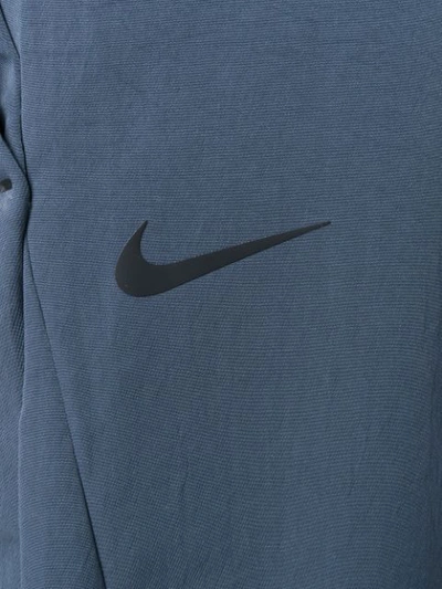 Shop Nike Cropped Track Pants In Blue