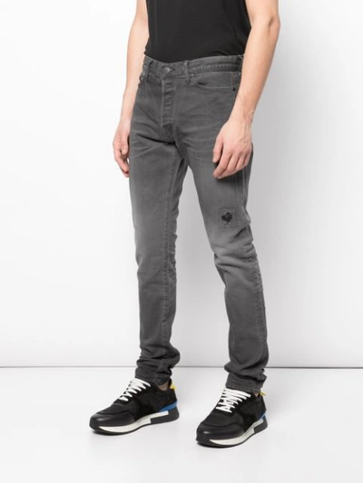 Shop John Elliott Washed Out Jeans In Grey