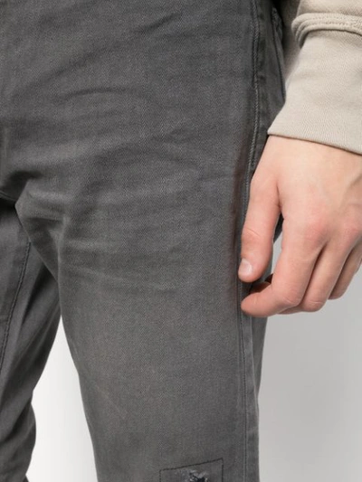 Shop John Elliott Washed Out Jeans In Grey