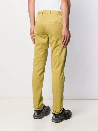 Shop Stone Island Logo Patch Chinos In Yellow