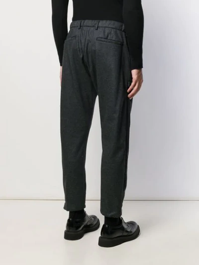 Shop Prada Zipped Cuffs Trousers In Grey