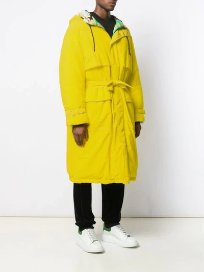 Shop Versace Hooded Belted Raincoat In Yellow