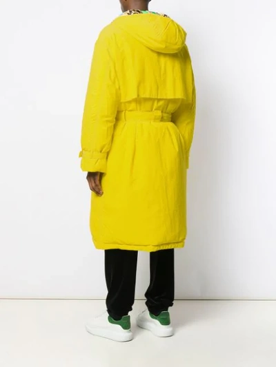 Shop Versace Hooded Belted Raincoat In Yellow