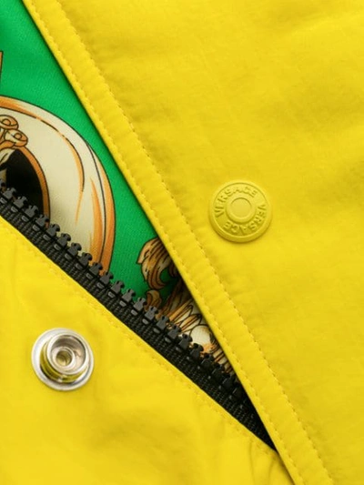 Shop Versace Hooded Belted Raincoat In Yellow