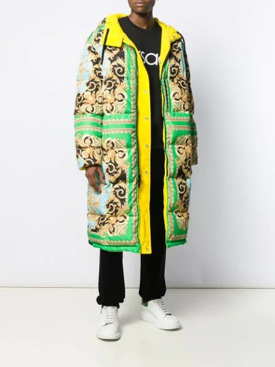 Shop Versace Hooded Belted Raincoat In Yellow