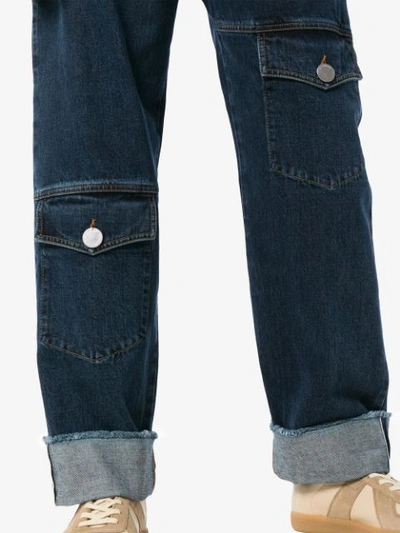 Shop Jw Anderson Multi Pocket Denim Trousers In Blue