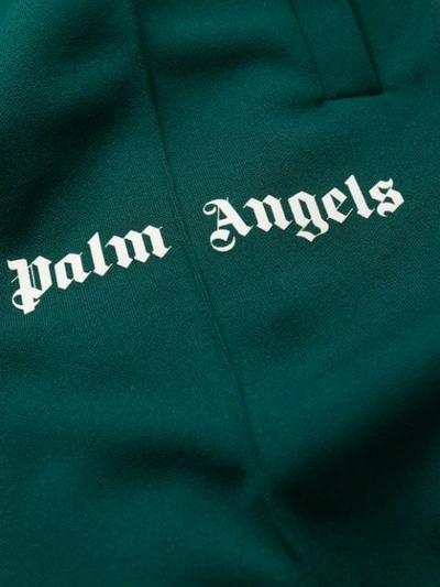 Shop Palm Angels Panelled Track Logo Trousers In Green