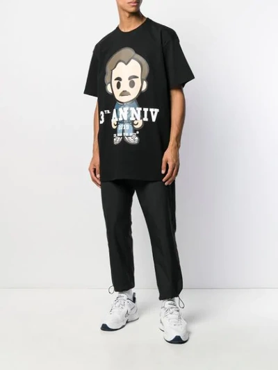 Shop Ih Nom Uh Nit Cartoon Logo Print T-shirt In Black