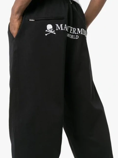Shop Mastermind Japan Logo Print Tapered Track Pants In Black