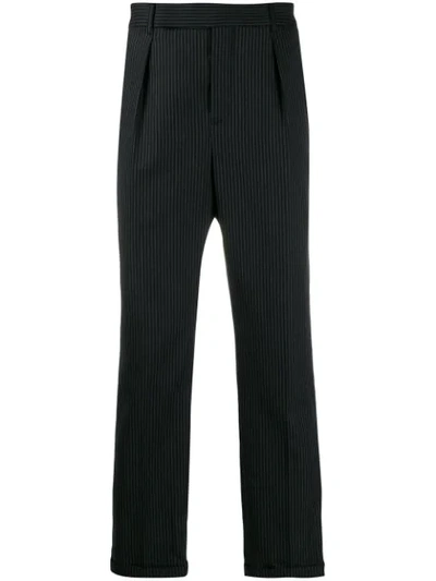 Shop Saint Laurent Pinstriped Cropped Trousers In Black