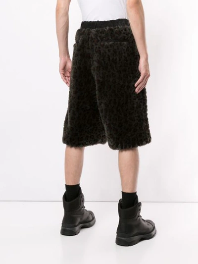 Shop Sacai Leopard Print Shearling Shorts In Black