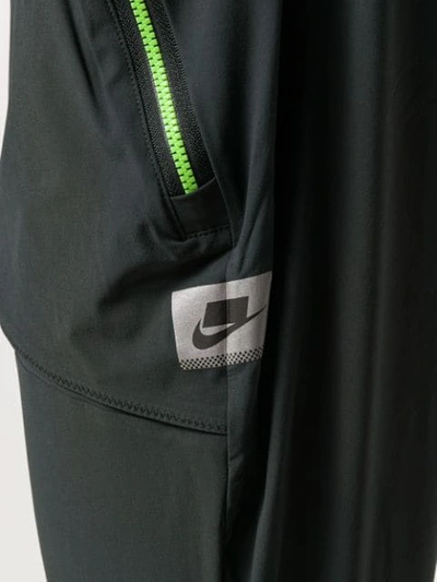 Shop Nike Wild Run Leggings In Grey