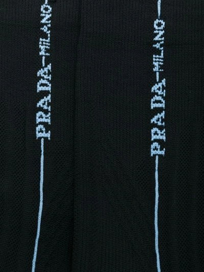 Shop Prada Logo Printed Socks In Black