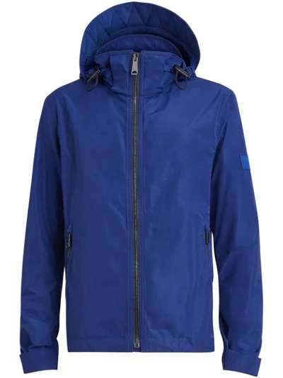 Shop Burberry Packaway Hood Rain Jacket - Blue