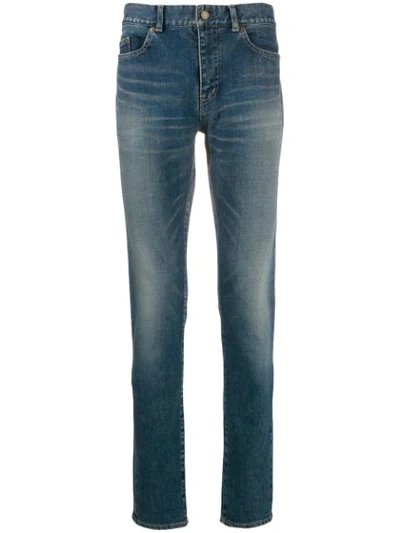 Shop Saint Laurent Faded Slim Jeans In Blue