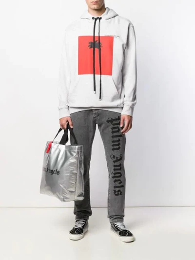 Shop Palm Angels Logo Print Jeans In Grey