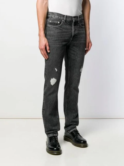 Shop Sandro Distressed Slim-fit Jeans In Black