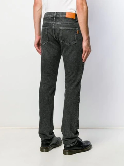 Shop Sandro Distressed Slim-fit Jeans In Black