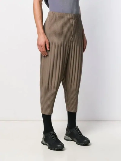 Shop Issey Miyake Pleated Drop Crotch Trousers In Green