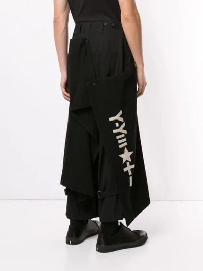 Shop Yohji Yamamoto Asymmetric Bib Trousers In Black