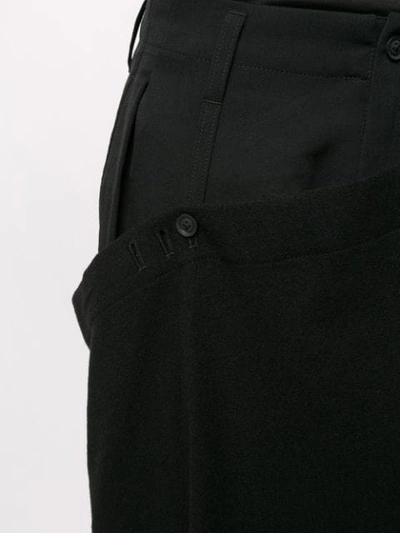 Shop Yohji Yamamoto Asymmetric Bib Trousers In Black