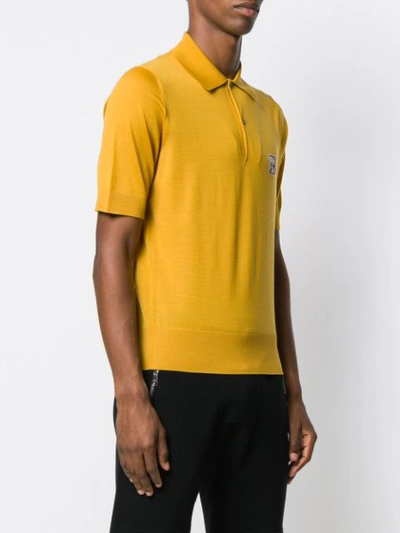 Shop Prada Logo Knitted Polo Shirt In Yellow