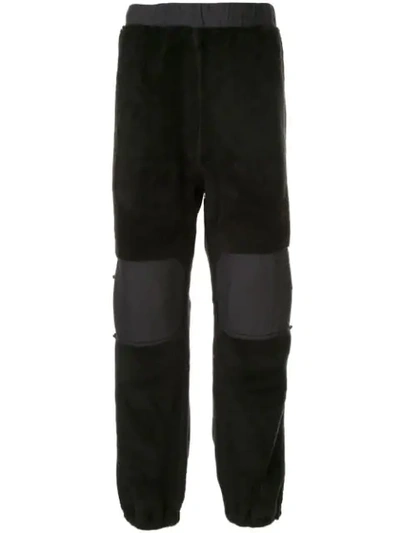 Shop Undercover Shearling Detail Trousers In Black