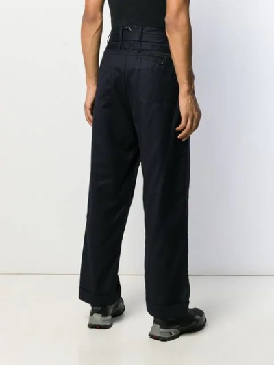 Shop Craig Green Turn Up Hem Trousers In Blue