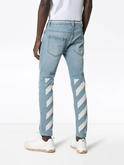 Shop Off-white Diagonal Stripe-print Jeans In Blue