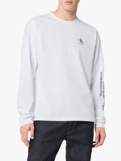 Shop Calvin Klein Jeans Est.1978 Ok Long Sleeved T In White