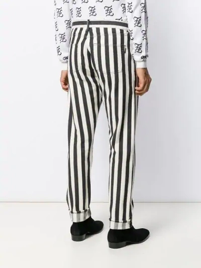 Shop Saint Laurent Striped Straight Jeans In White