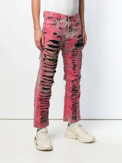 Shop Gucci Ripped Jeans In Red