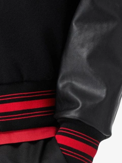 Shop Burberry Contrast Sleeve Logo Graphic Bomber Jacket In Black