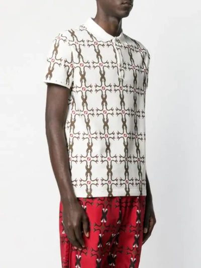 Shop Fendi Entwined Snake Print Polo Shirt In White