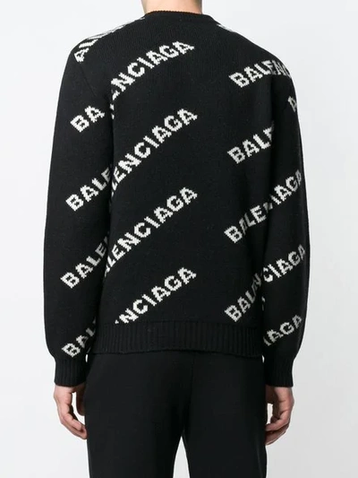 Shop Balenciaga All Over Logo Crewneck Jumper In Black