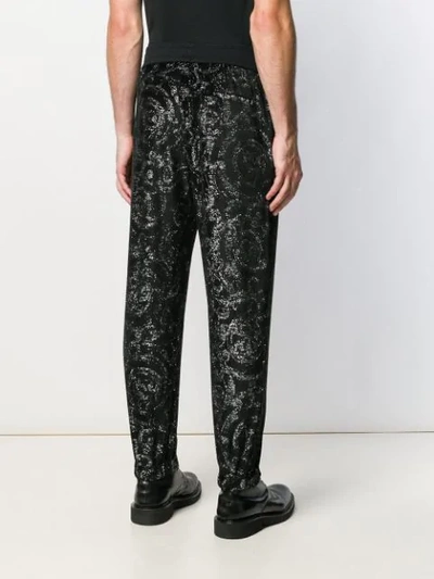 Shop Versace Elastic Waist Lurex Trousers In Black