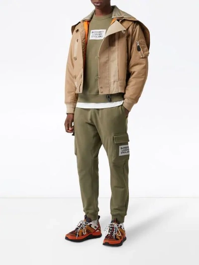 Shop Burberry Logo Patch Track Pants In Green